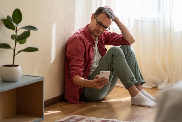 Man sitting on the floor